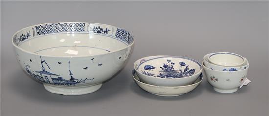 A Liverpool Delft blue and white bowl, decorated buildings and trees and three early tea bowls with saucers